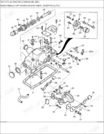 Ford 7610 exploded view of the hydraulic lift cover and related parts (figure 05A02), with numbered callouts for the lift cover, gasket, control linkage, relief valve and oil filter.