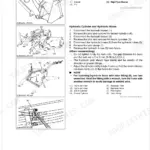 Kubota LA534A-AU service manual: bucket, boom, and hydraulic cylinder disassembly and assembly procedures.