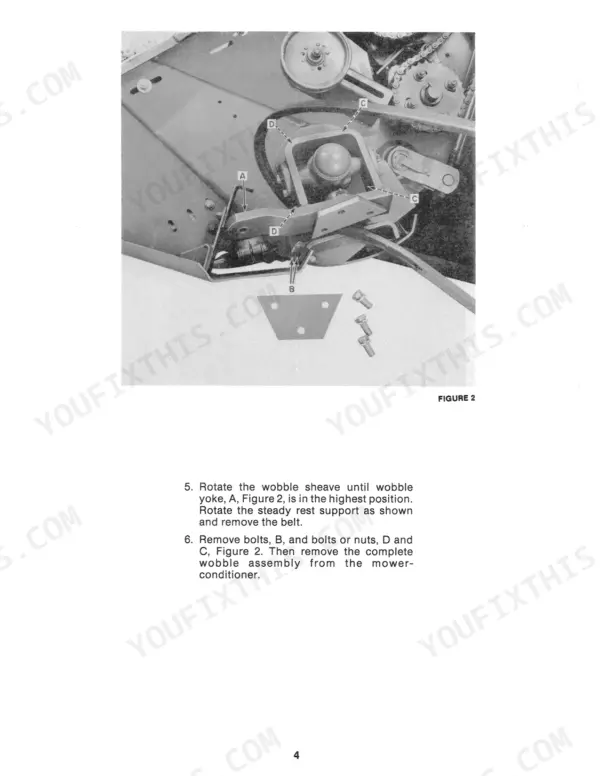 Ford New Holland 472, 477, 478, 479, 488 procedure to remove the wobble assembly and drive belt from mower-conditioner.