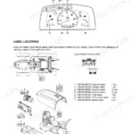 Yanmar EF312T, EF352T instrument cluster lamps, indicators, and safety label locations diagram with parts list.