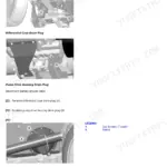John Deere 8310RT rear axle assembly removal, with the differential case drain plug and related points called out.