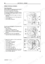 fiat-kobelco-t13-t14-t17-telehandler-service-manual-604-02-395-01-procedures-86.webp Fiat Kobelco T13, T14, T17 engine overhaul on bench disassembly procedures with component diagrams for oil filter, starter, and fuel system.