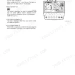 A page from a troubleshooting manual section on the monitor unit, detailing auto-idle, overload, auto axle lock, and glow signal displays with an image of the monitor.