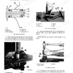 John Deere 8000 Series Grain Drill axle and axle plate disassembly procedures, cross-section diagrams, and seal removal instructions.