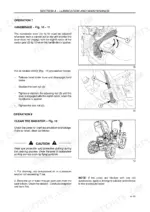 new-holland-f480-tractor-operator-manual-84409819-procedures-112.webp New Holland F480 handbrake adjustment procedure and radiator cleaning instructions with component diagrams.