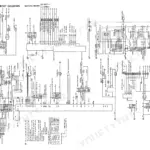 Kobelco SK220, SK220LC electrical circuit diagram showing cab components, fuse box, gauges, and accessory wiring connections.