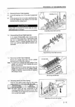 Mitsubishi S4S, S6S engine disassembly procedures for rocker shaft, cylinder head, and valve spring removal.